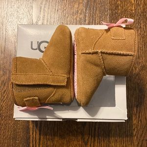 LIKE NEW - chestnut infant Uggs with pink bow on the back size 1